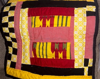 Black, Gold & Red Quilted Pillow