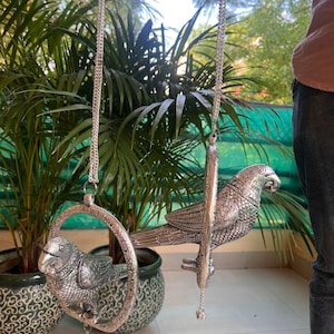 Handcrafted german silver hanging Parrot.