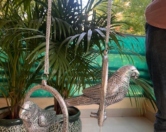 Handcrafted german silver hanging Parrot.