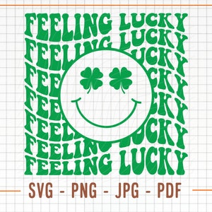 May include: Green and white graphic design with the text "Feeling Lucky" repeated in a circular pattern. A green smiley face with four-leaf clover eyes is in the center of the design.