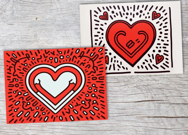 Puede incluir: Dos impresiones art&iacute;sticas con dise&ntilde;os de coraz&oacute;n. Una impresi&oacute;n tiene un fondo rojo con un coraz&oacute;n blanco y contornos negros. La otra impresi&oacute;n tiene un fondo blanco con un coraz&oacute;n rojo y contornos negros. Ambas impresiones son de estilo pop art.