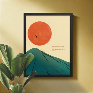May include: A minimalist art print with a quote by Francois de la Rochefoucald: "Whatever is beautiful at all is beautiful in itself. It's beauty ends there, and praise has no part in it." The print features a stylized mountain and a red sun with a bird flying above it.