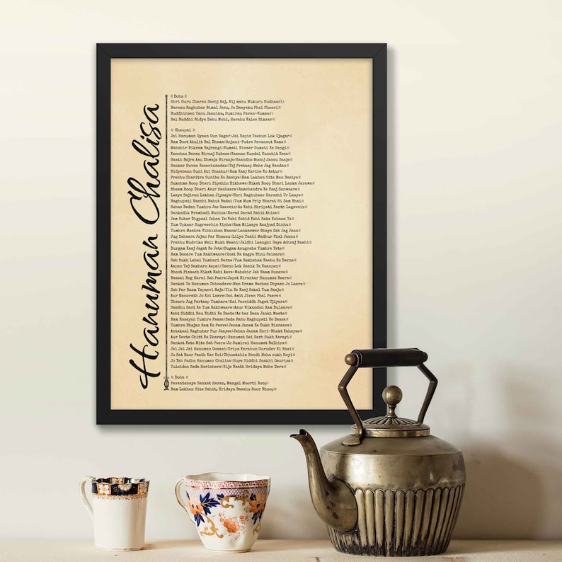 Hanuman Chalisa poster featuring the sacred devotional prayer, ideal for prayer rooms and meditation spaces, framed in black as a spiritual wall decor.