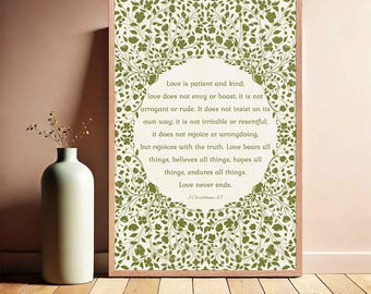 May include: A printable wall art design with a white background and green floral pattern. The text reads "Love is patient and kind: love does not envy or boast; it is not arrogant or rude. It does not insist on its own way; it is not irritable or resentful; it does not rejoice at wrongdoing, but rejoices with the truth. Love bears all things, believes all things, hopes all things, endures all things. Love never ends. 1 Corinthians 13".