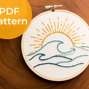 May include: A PDF pattern for an embroidery hoop design featuring a yellow sun with rays and blue waves.