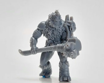 May include: A gray miniature figurine of a fantasy warrior, holding a large hammer. The figure has detailed armor, fur-like textures, and a fierce expression. The miniature is set against a plain white background.