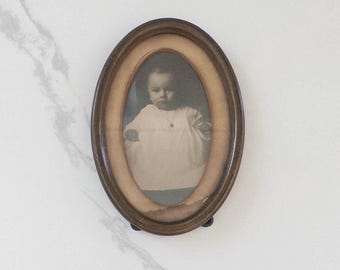Antique Oval Gold Finish Frame with 1908 Baby Photo