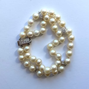 1960&#39;s Lustrous Pearl Bracelet with Diamonds and White Gold