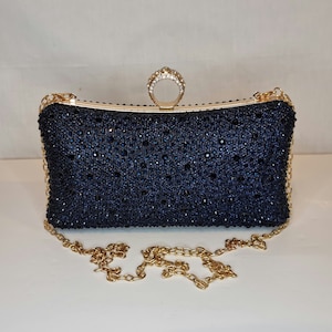 Blue sparkly clutch bag hotsell