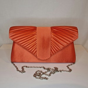Coral clutch new arrivals bag uk