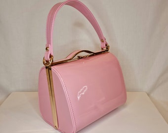 Blush pink patent clutch bag discount