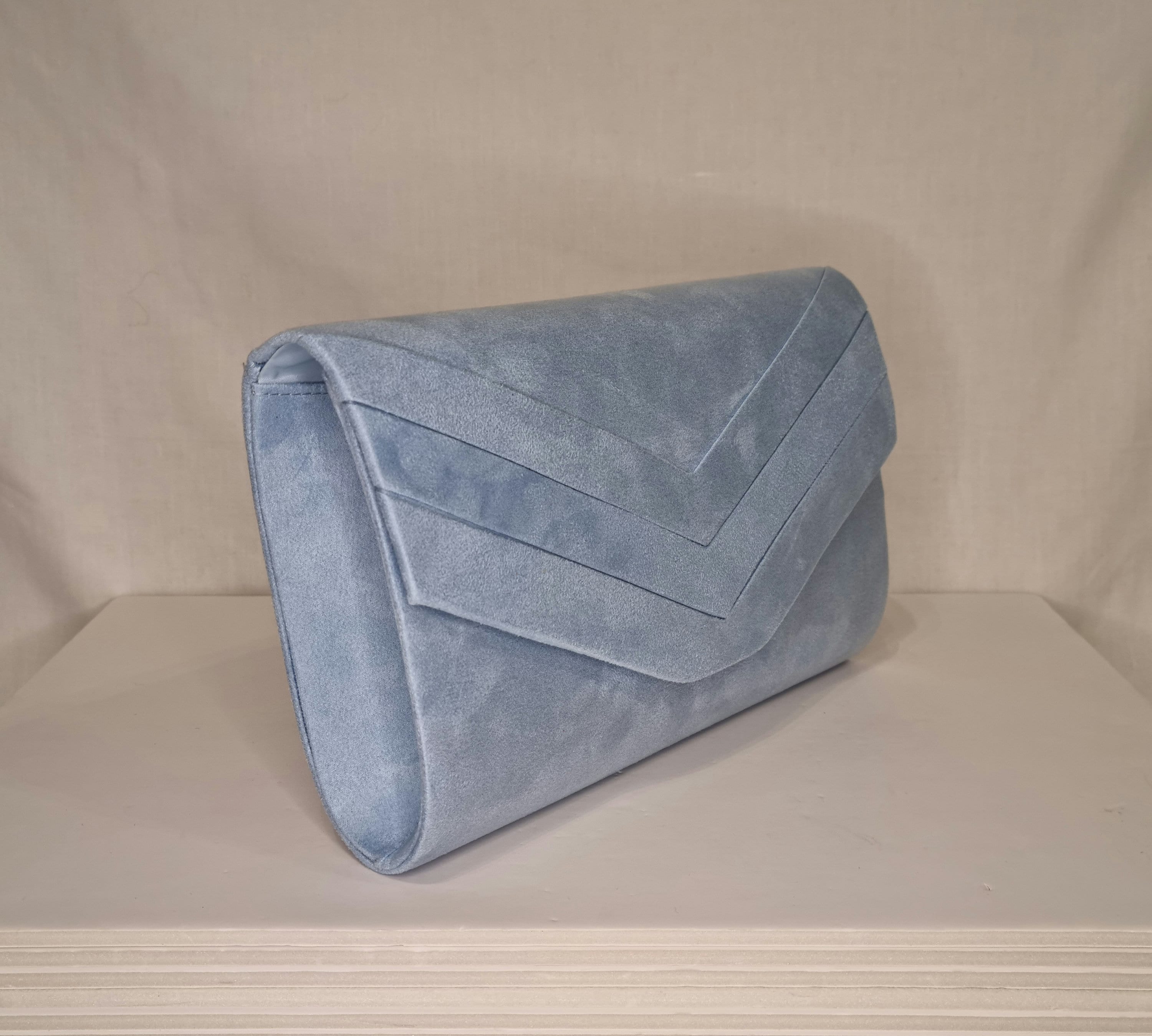 Pale blue suede sales clutch bag