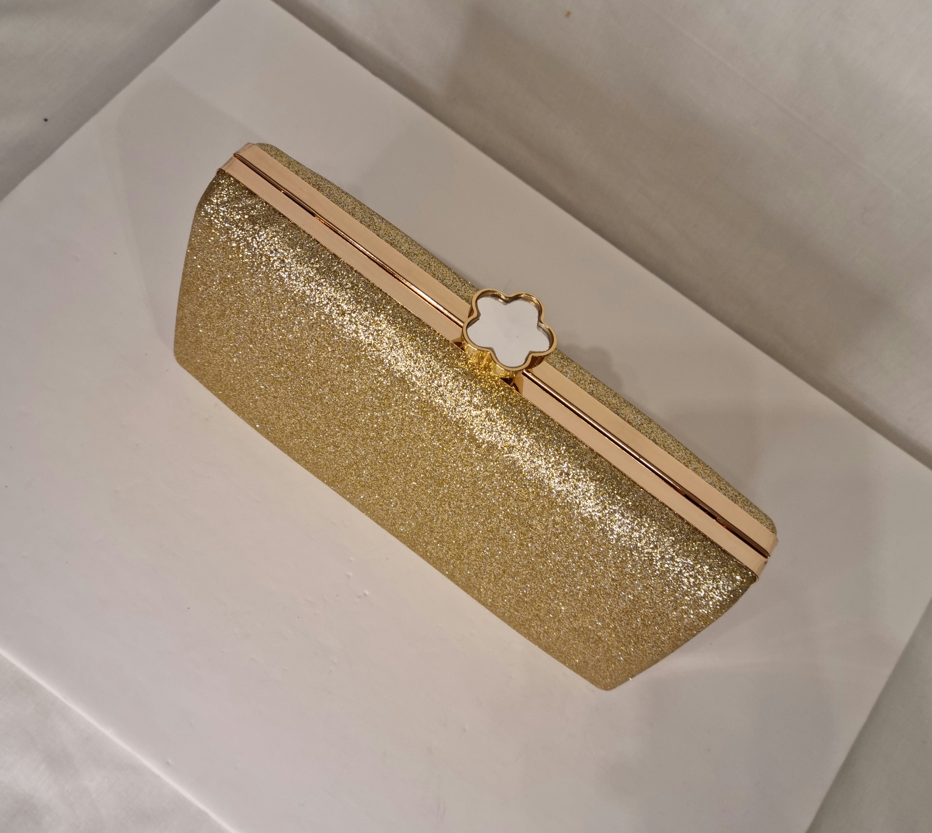 Gold hotsell glitter clutch