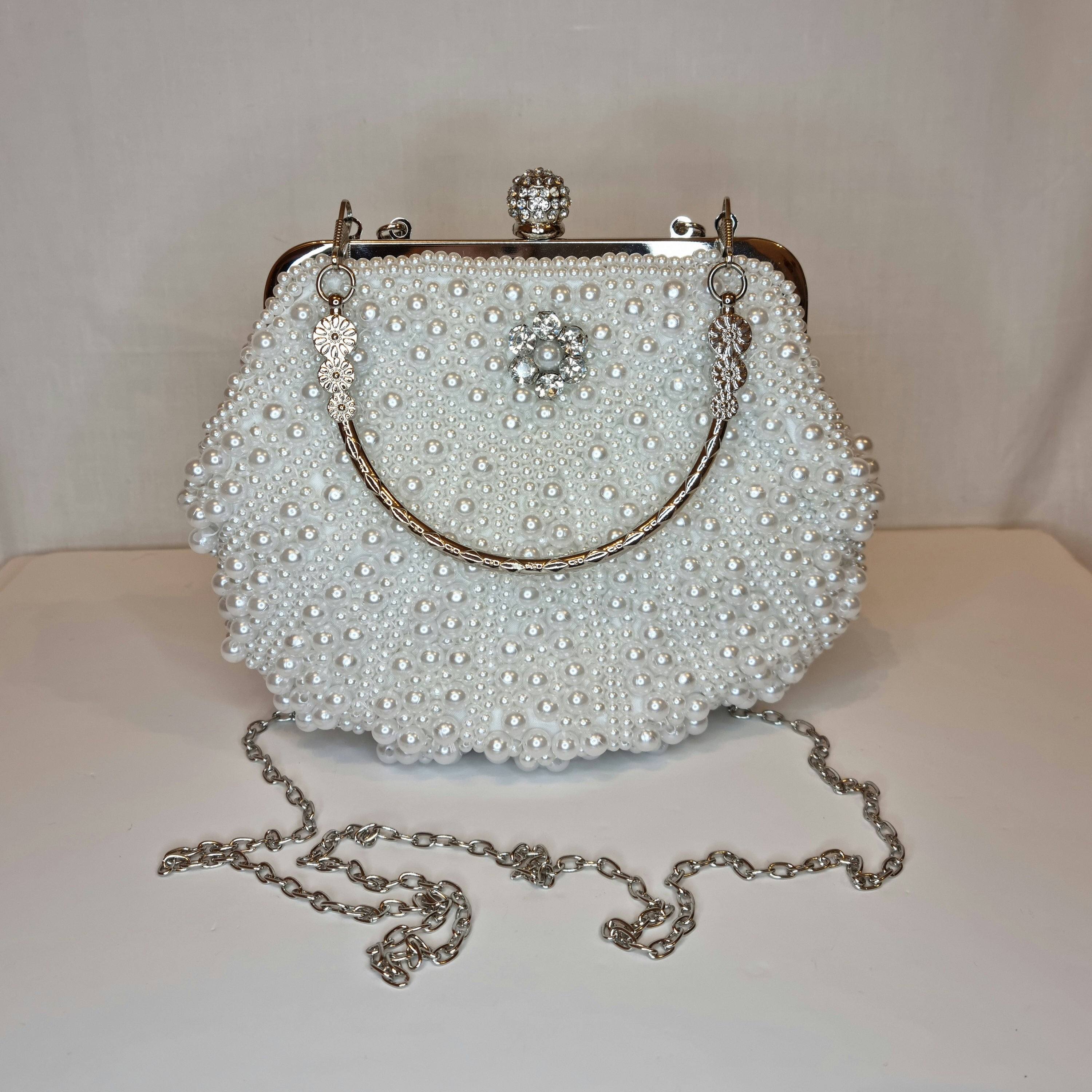 White Maud pearl-embellished satin clutch bag | Anya Hindmarch | MATCHES UK