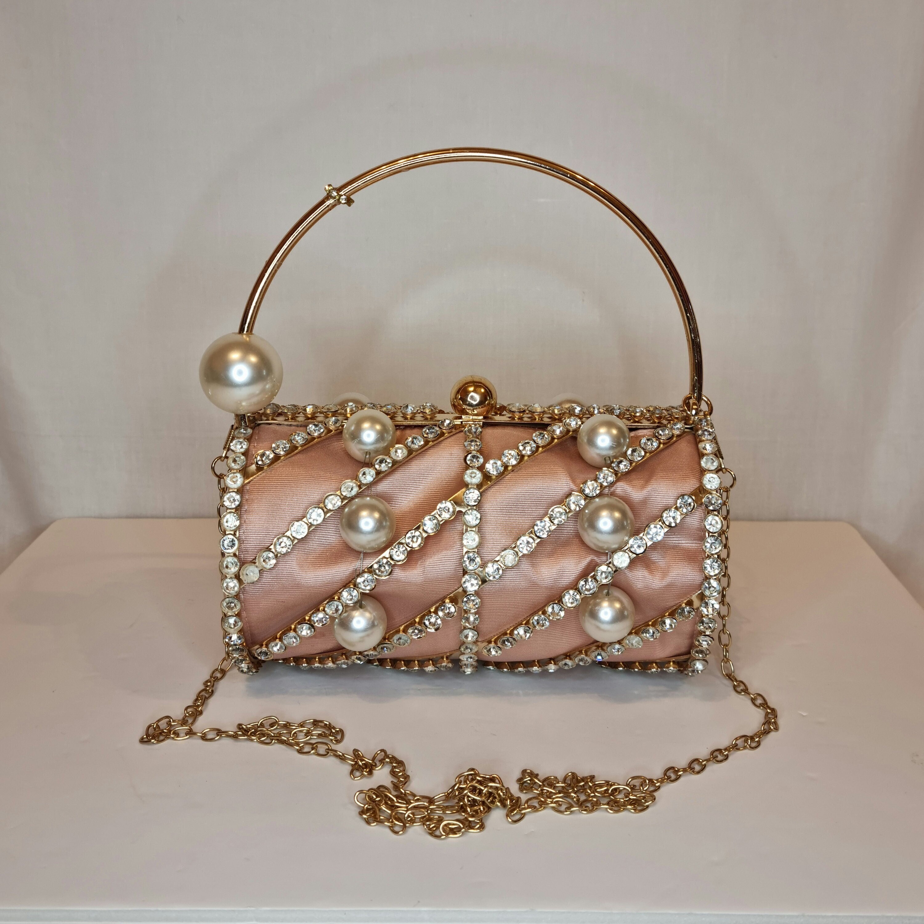 Gold cage clutch bag outlet