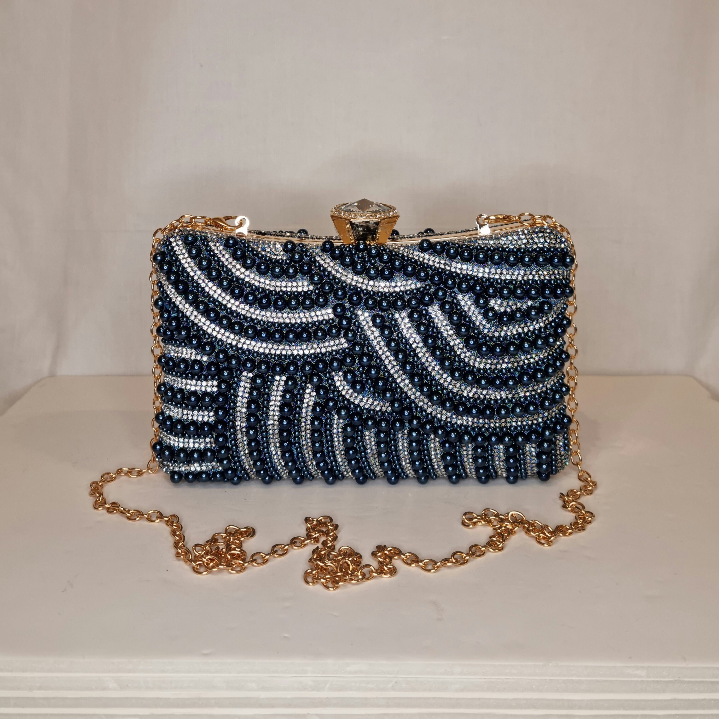 Navy and cream clutch bag hotsell