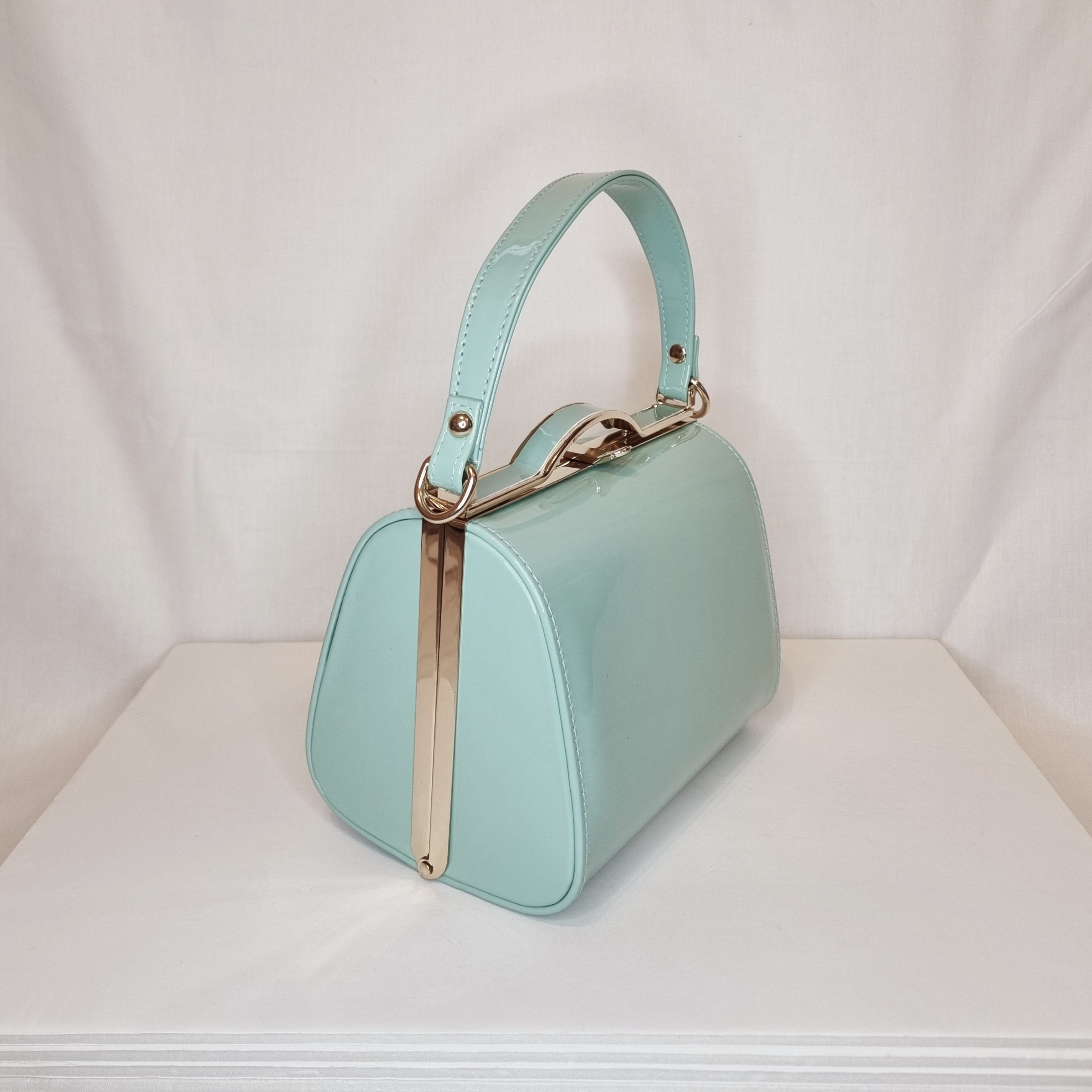 Mint blue purse deals