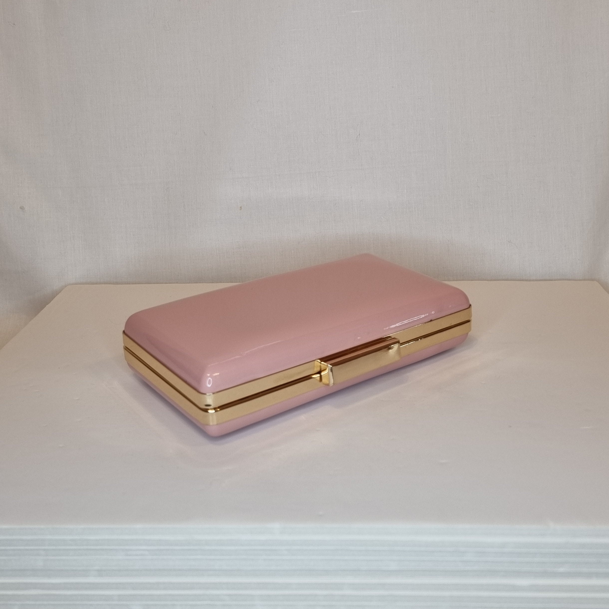 Blush patent clutch bag sale