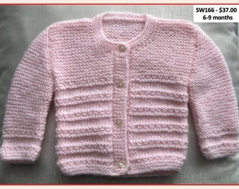 Pink hand-knitted sweater for a 6=9 month old