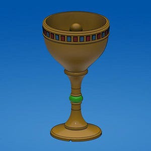 May include: A golden chalice with a wide bowl and a slender stem. The rim is decorated with a band of alternating red and blue squares. A green band accents the stem. The chalice sits on a round base.