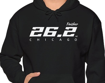 May include: Black hooded sweatshirt with a white graphic that says "Finisher 26.2 Chicago"