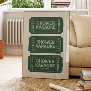 Elevate your space with this trendy shower karaoke ticket print. This sage green and pink aesthetic wall art is an ideal decor for a bathroom.