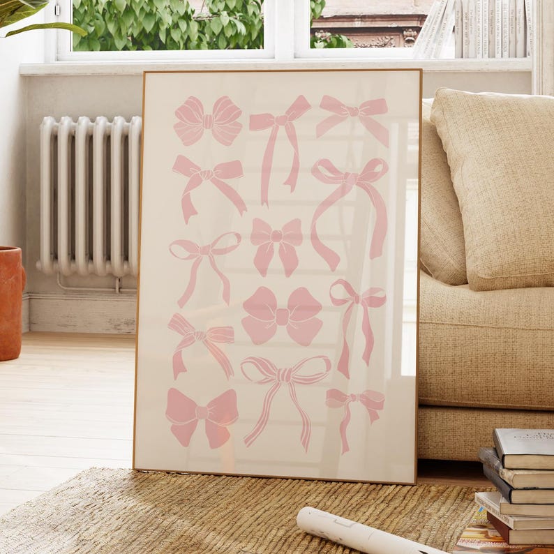 Light pink watercolor bows printable wall art on a warm neutral background.