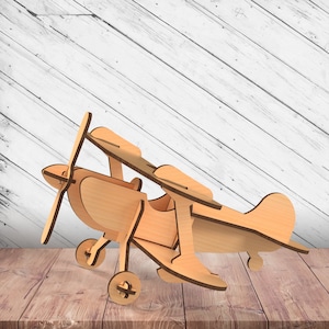 Avión de madera rompecabezas 3D juguete Glowforge Svg corte láser Dxf xTool D1 plano de corte sierra de calar descarga instantánea archivo digital vector ai pdf eps