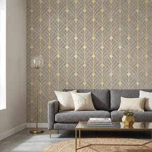 May include: Wallpaper featuring a repeating fan-shaped geometric pattern in muted gray and metallic gold lines. The design consists of symmetrical, upward-pointing arches arranged in a grid, creating a structured, decorative wall covering.