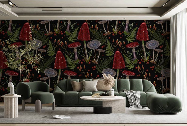 May include: A living room interior design featuring a dark green sofa and armchair, a coffee table, and a black wall with a red and green mushroom wallpaper pattern.