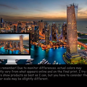 May include: An aerial view of a city skyline at dusk with a tall, modern skyscraper in the foreground. The city is lit up with lights, and the water is a deep blue.