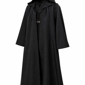 May include: A floor-length black hooded cloak featuring wide sleeves and a silver-toned metal clasp at the neckline. The garment is constructed from a solid black fabric and includes a hood that drapes over the shoulders and upper back area.