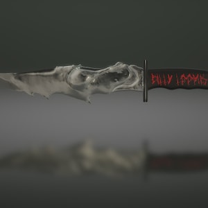 May include: A silver knife with a black handle and red text that reads "BILLY LOVES YOU".