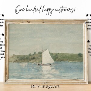 May include: A watercolor painting of a sailboat on a body of water with green hills in the background. The painting is framed in a light wood frame. The image includes customer reviews with five stars and positive comments about the painting and the seller.