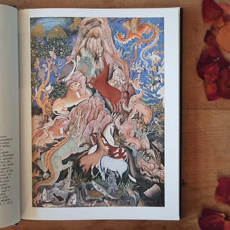 May include: A vibrant, detailed illustration from a book, featuring a fantastical scene with various animals and creatures. The artwork showcases a mountain, a phoenix, lions, and other animals in a colorful, detailed style. The background is a mix of blue, green, and brown.