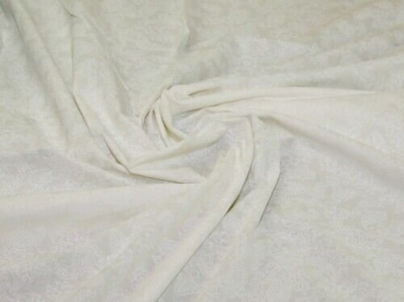 John Louden 100% Cotton Lacquer Fabric White on White - per metre (Paisley print)