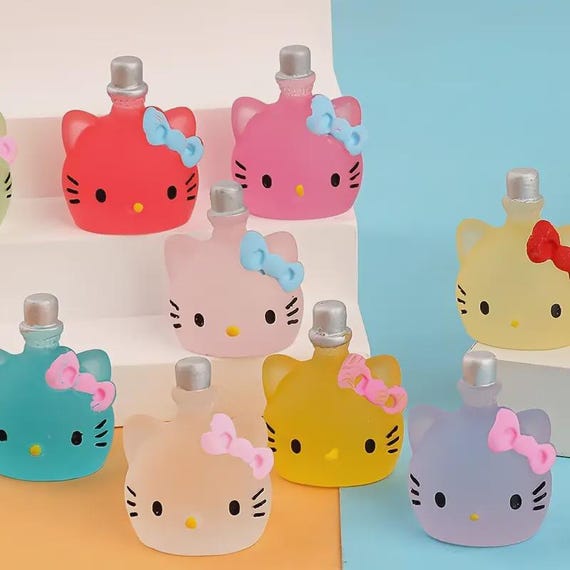 Hello Kitty Glow in the dark charms, head accessory