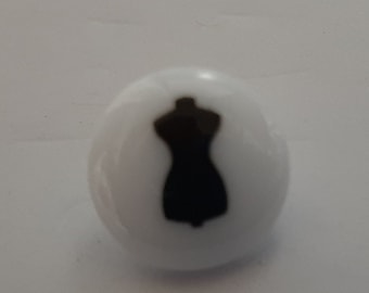 Buttons White Plastic with sewing items on Mannequin, sewing machine, jacket, button