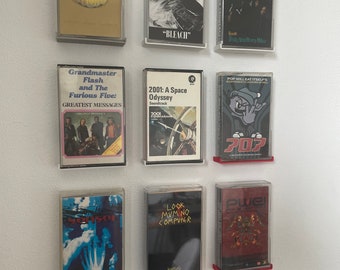Supports muraux pour cassettes
