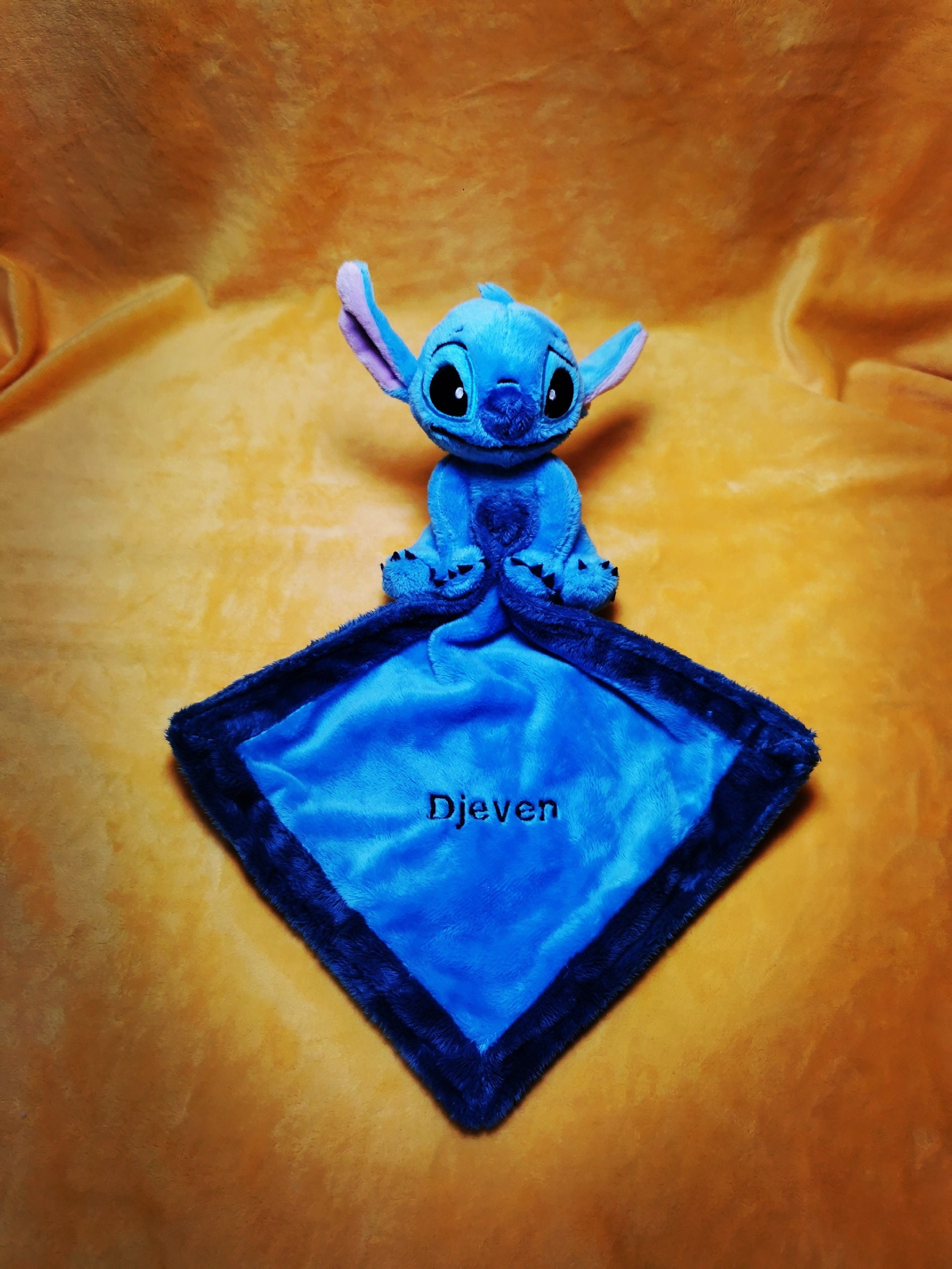 Disney - Stitch - Peluche avec doudou blanc bleu 25 cm