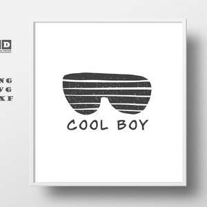 May include: Black and white graphic design of sunglasses with the text "COOL BOY" underneath.