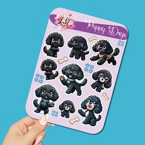 May include: A sheet of stickers featuring cartoon black poodles with various poses, paw prints, and bone graphics. The stickers are on a lavender background with the words "Puppy Days" and a floral logo.