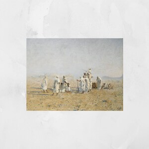 a framed painting of Bedouins in the desert