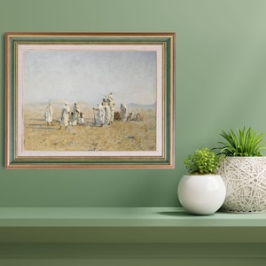 a framed painting of Bedouins in the desert