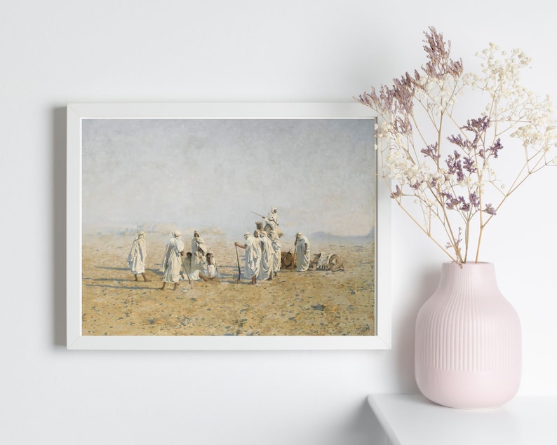a framed painting of Bedouins in the desert