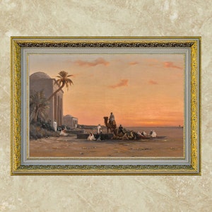 a framed picture of the artwork called Halt by the Well; by August Veillon. The image is of arab men and their camels in the desert next to a well and buildings.