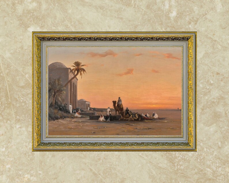 a framed picture of the artwork called Halt by the Well; by August Veillon. The image is of arab men and their camels in the desert next to a well and buildings.