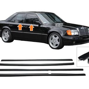 May include: A black sedan with silver rims and a chrome grille. The image also shows black rubber trim pieces, likely for a car door or window. The car has orange turn signals.
