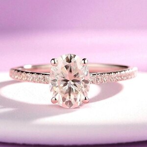 Oval Simulated Diamond Hidden Halo Engagement Ring: Sterling Silver Promise Ring