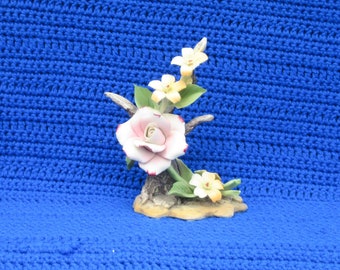 Arnart  1987  Pink Rose on Wood Branch with yellow flowers